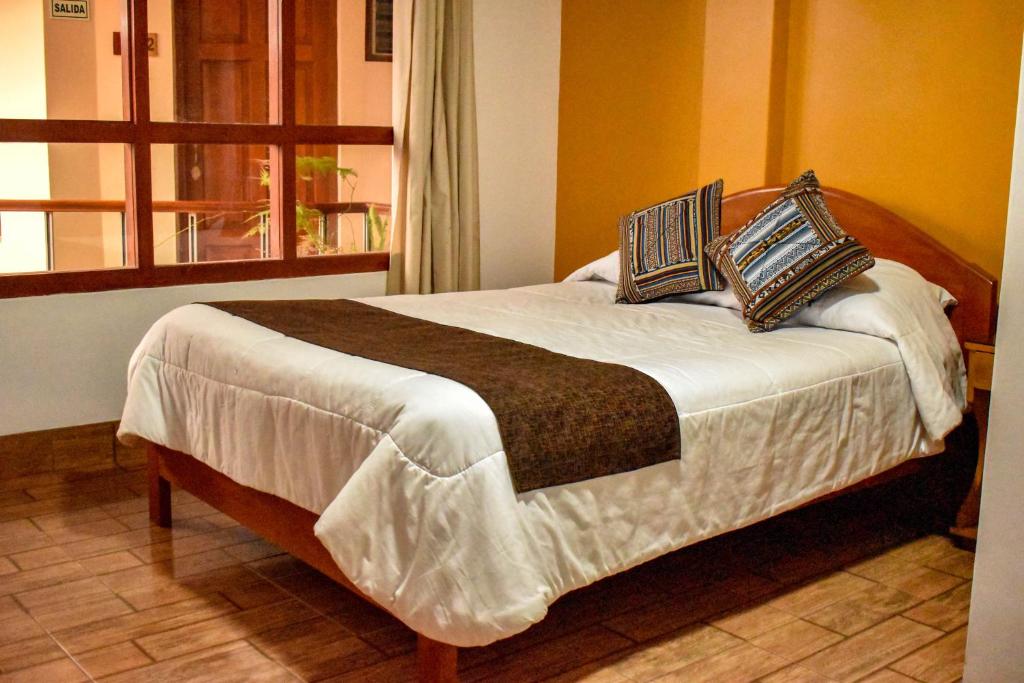 Postel nebo postele na pokoji v ubytování Hotel del Sur