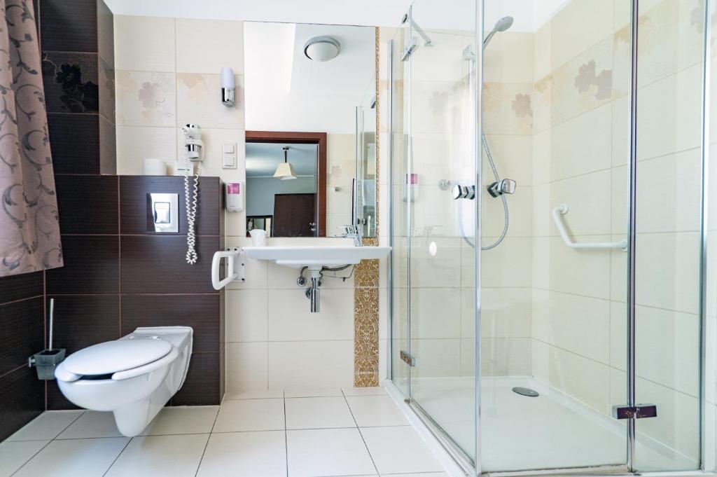 Koupelna v ubytování Hotel Pod Filarami