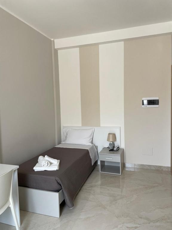 Postel nebo postele na pokoji v ubytování Karpignàna Hotel
