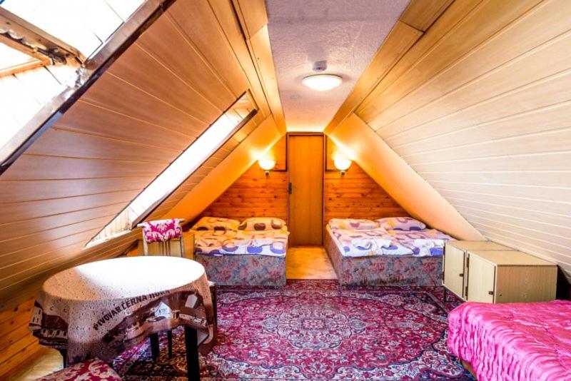 Postel nebo postele na pokoji v ubytování Hotel Fran