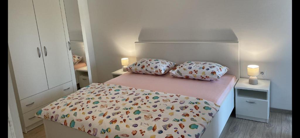 Postel nebo postele na pokoji v ubytování Villa Palma