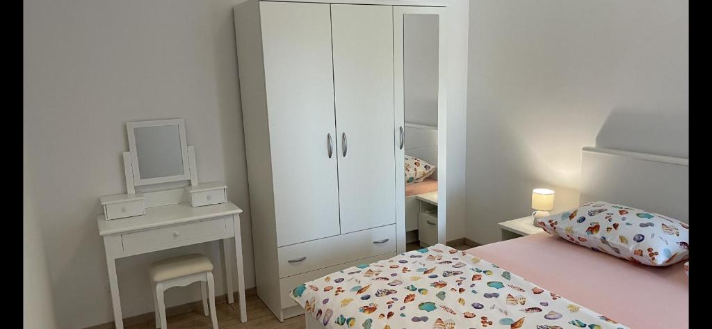 Postel nebo postele na pokoji v ubytování Villa Palma