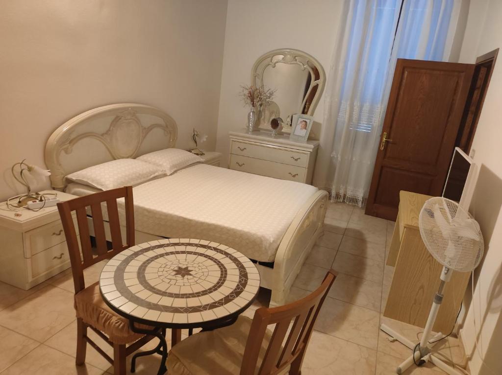 Postel nebo postele na pokoji v ubytování Guest House Efisio