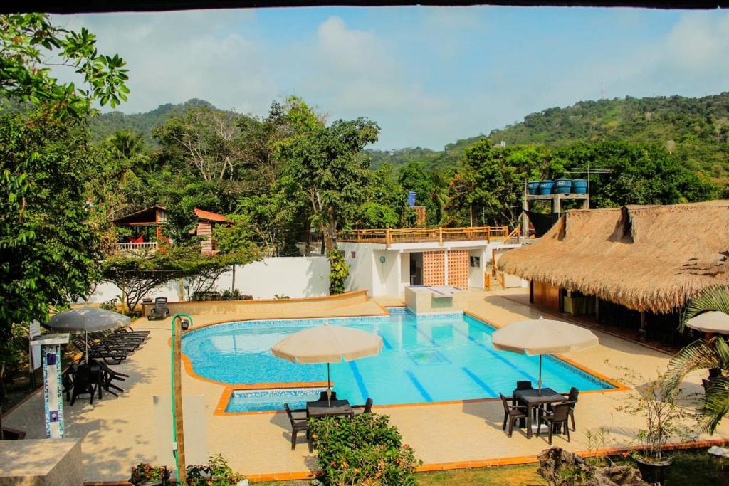 O vedere a piscinei de la sau din apropiere de Hotel Mares Capurganá