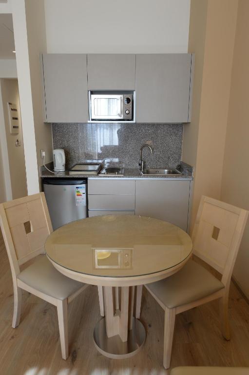 Kuchyň nebo kuchyňský kout v ubytování Nest 1 Hotel