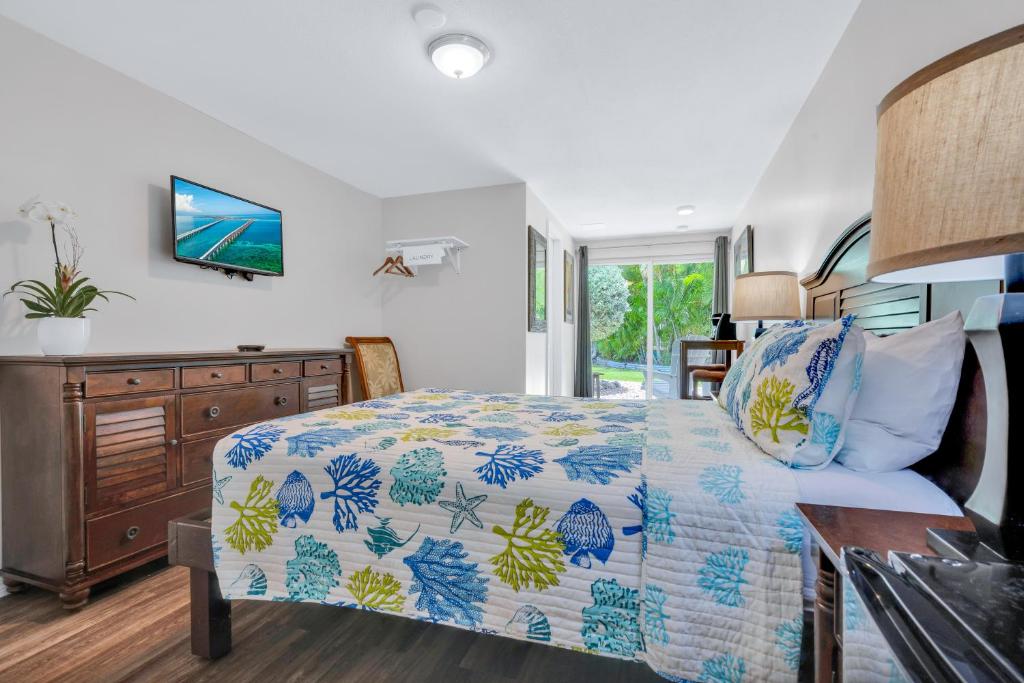 Postel nebo postele na pokoji v ubytování Coconut Cay Resort