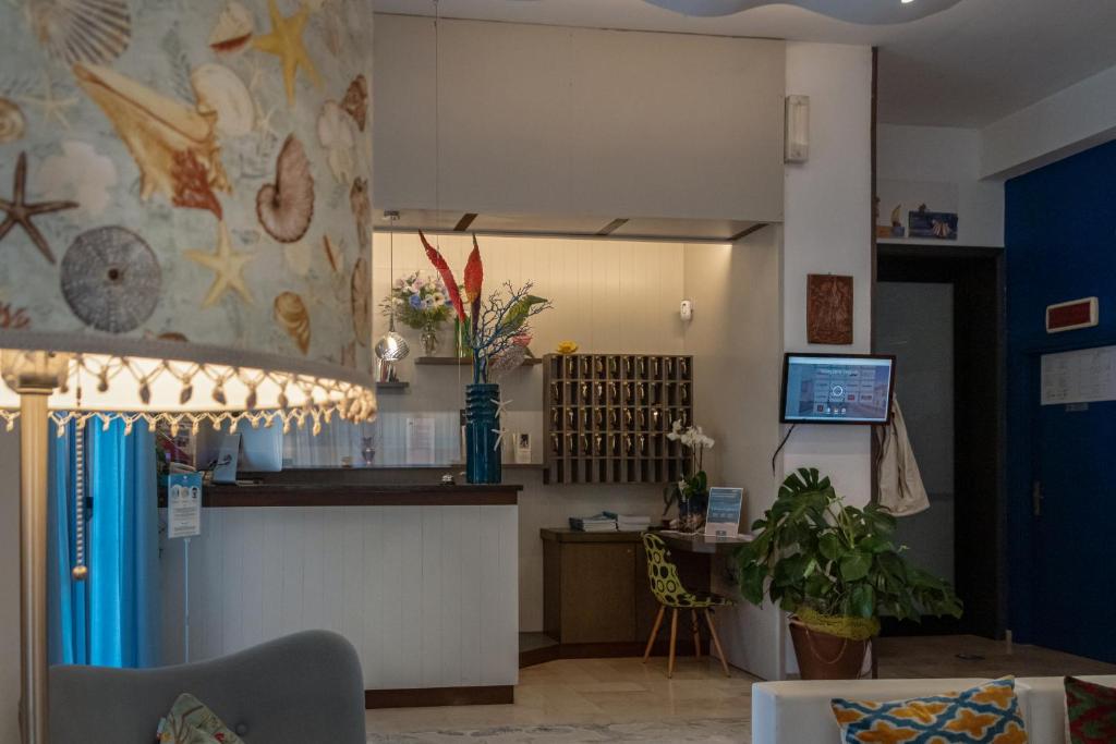 TV a/nebo společenská místnost v ubytování Hotel Boston