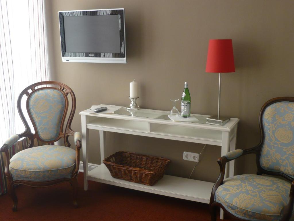 TV a/nebo společenská místnost v ubytování Hotel Waldhof auf Herrenland