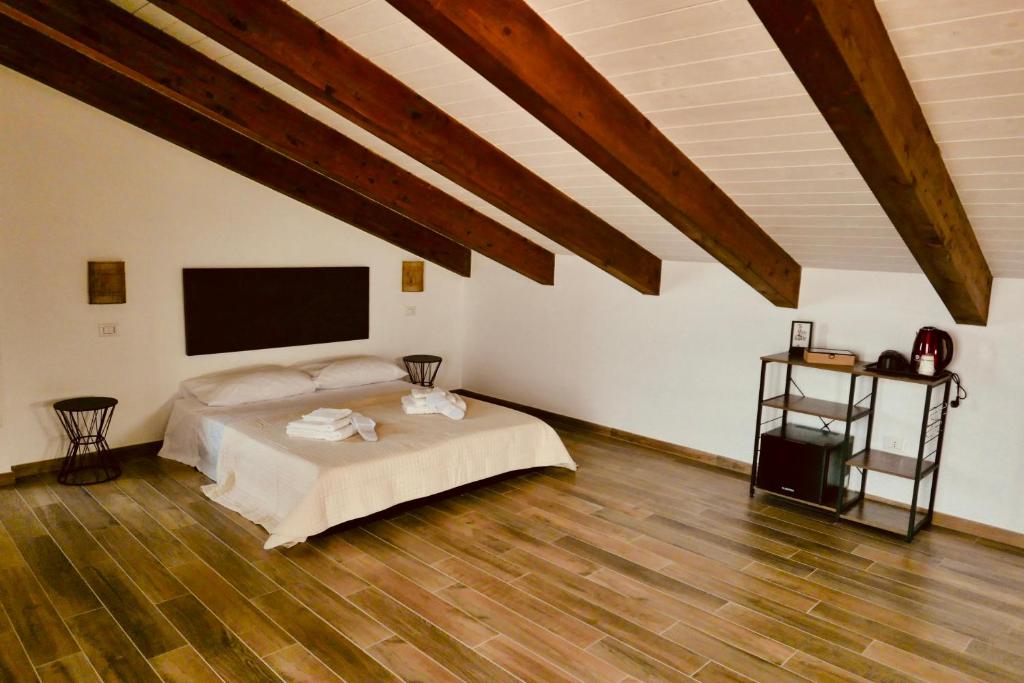 Postel nebo postele na pokoji v ubytování A casa di Alberta B&B Relais