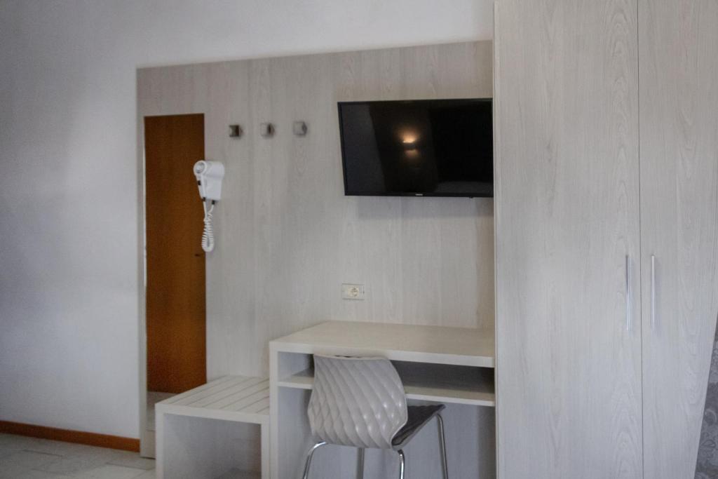TV a/nebo společenská místnost v ubytování Hotel Boston