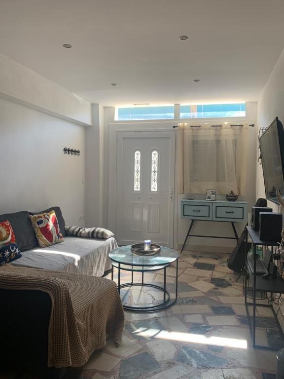 A television and/or entertainment centre at Melinas Maisonette