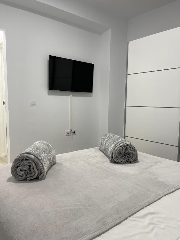 Postel nebo postele na pokoji v ubytování Apartamento a 50 metros de la Plaza del Charco, Puerto de la Cruz
