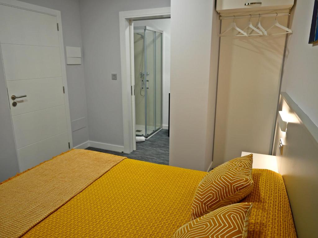Postel nebo postele na pokoji v ubytování Siaba Pensión Boutique