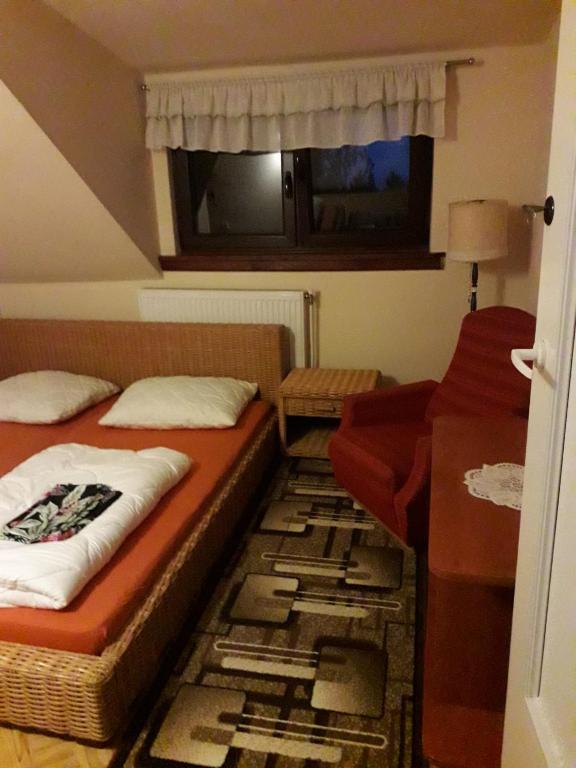 Postel nebo postele na pokoji v ubytování Agroturystyka Falinka