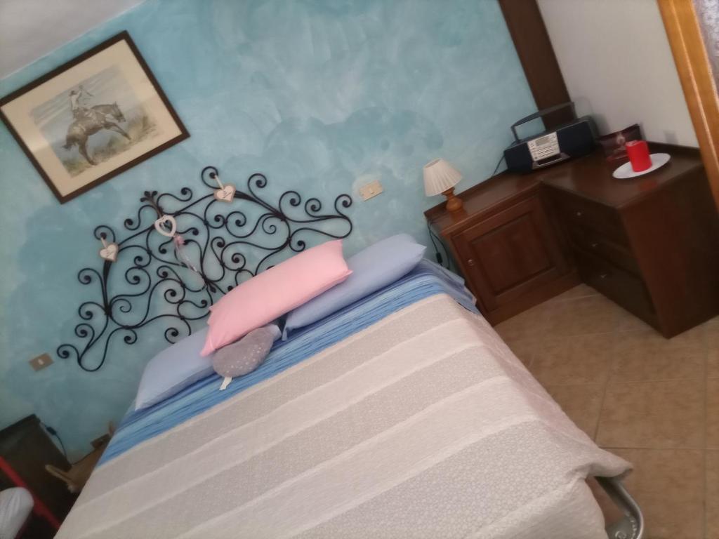 Postel nebo postele na pokoji v ubytování Il Castello