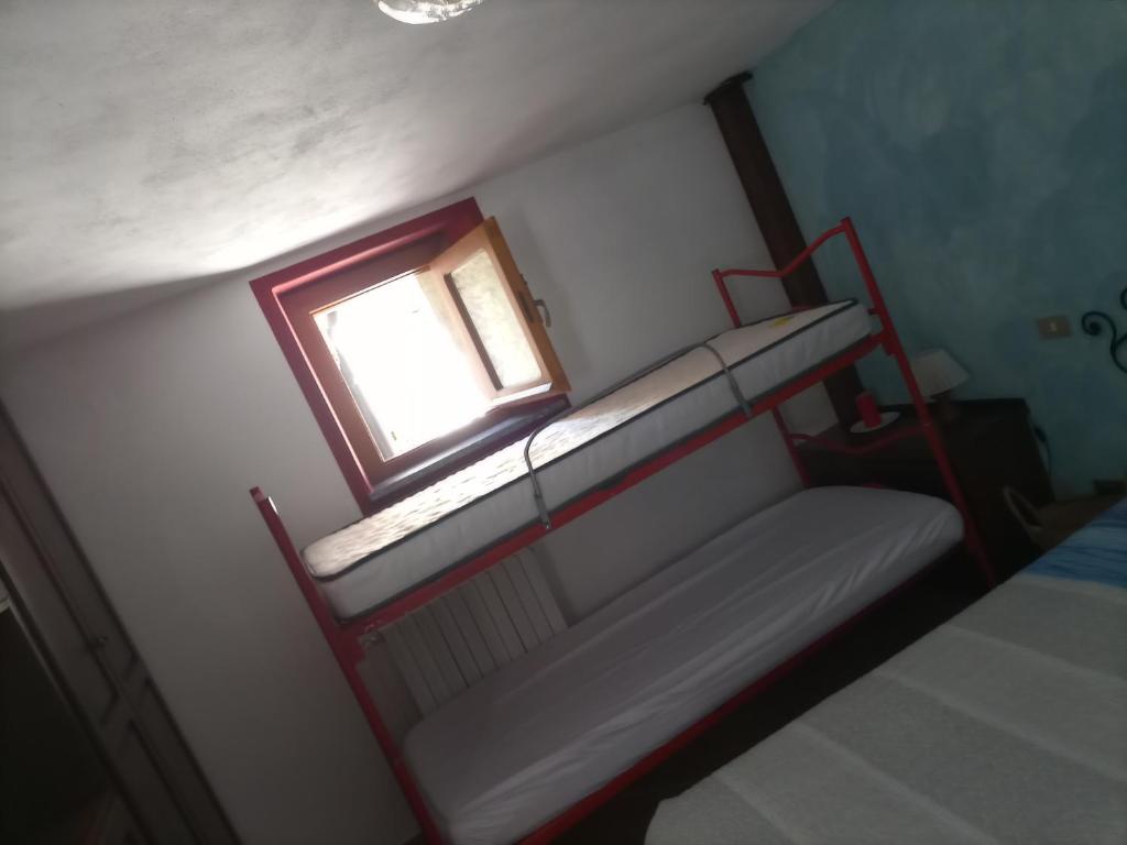 Postel nebo postele na pokoji v ubytování Il Castello
