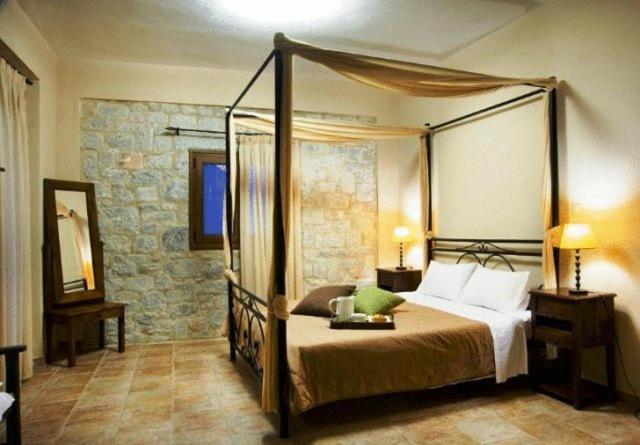 Postel nebo postele na pokoji v ubytování Vlyhada Guesthouse