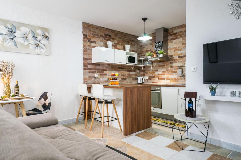 Kuchyňa alebo kuchynka v ubytovaní Apartman Evita
