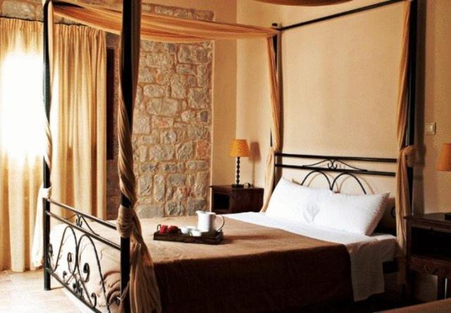 Postel nebo postele na pokoji v ubytování Vlyhada Guesthouse