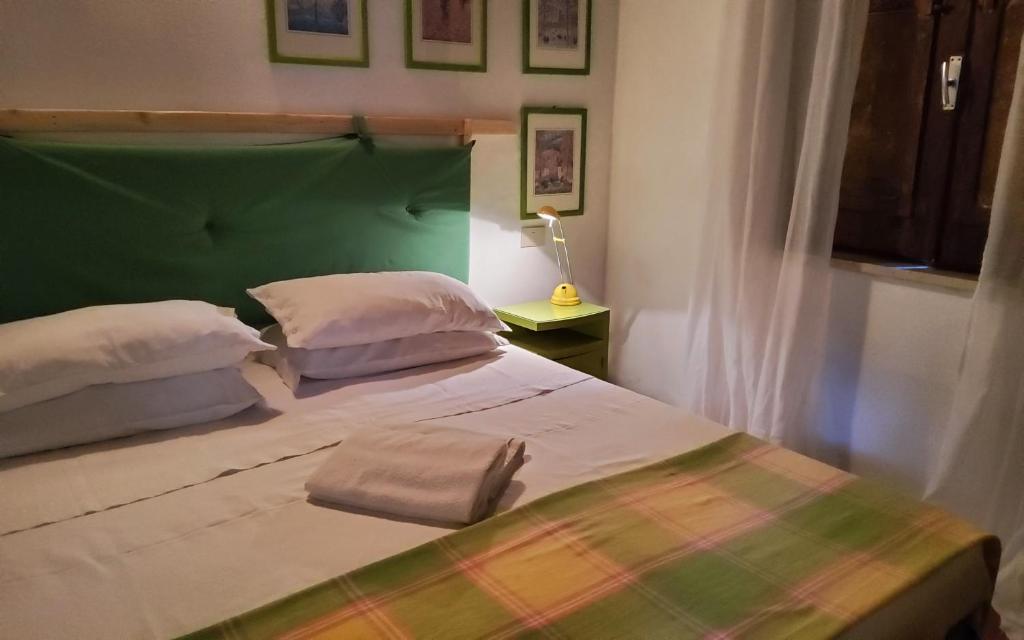 Postel nebo postele na pokoji v ubytování Villa Marinella