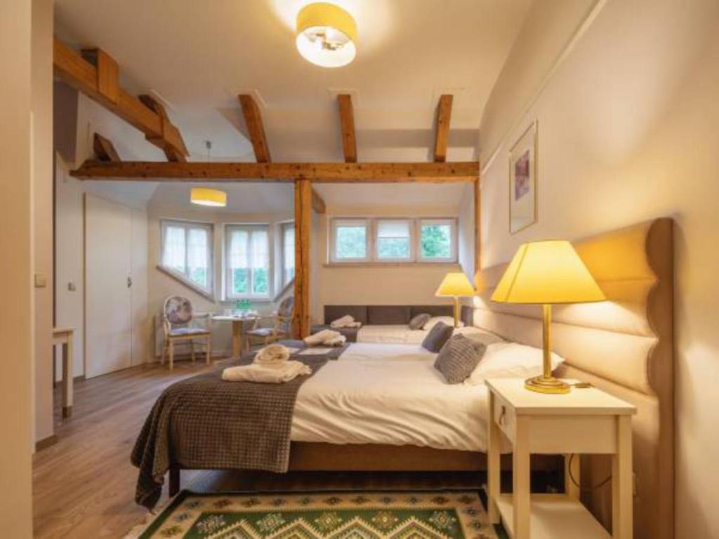 Postel nebo postele na pokoji v ubytování Villa Lessing
