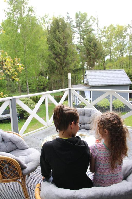 Balkón nebo terasa v ubytování Grygielówka nad jeziorem - sauna & jacuzzi