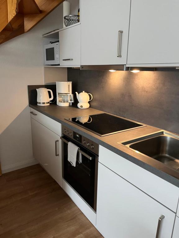 Kuchyň nebo kuchyňský kout v ubytování Gorch-Fock-Straße 2