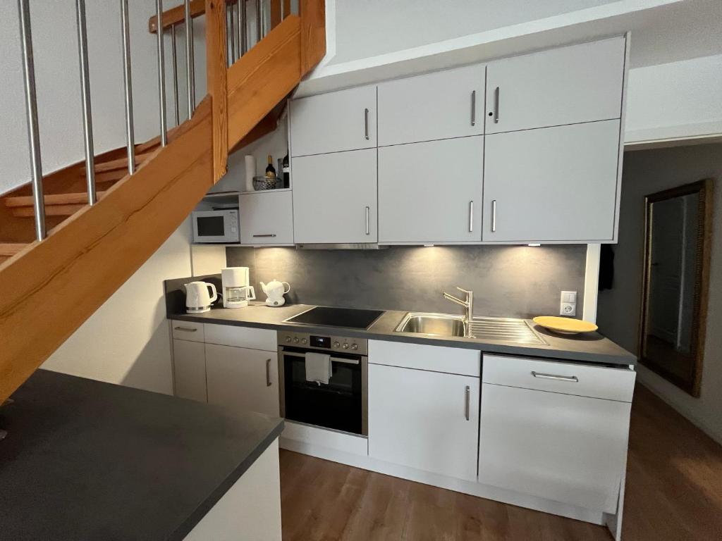 Kuchyň nebo kuchyňský kout v ubytování Gorch-Fock-Straße 2