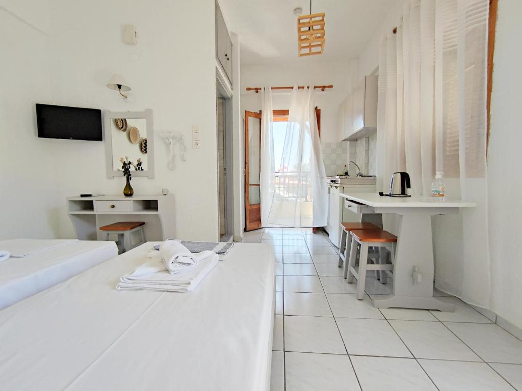 A television and/or entertainment centre at Emilia Apartments