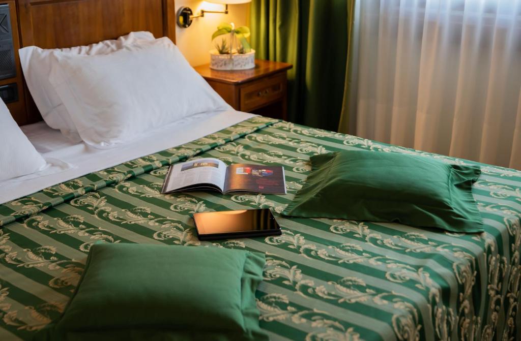 Postel nebo postele na pokoji v ubytování Hotel Ristorante Fior