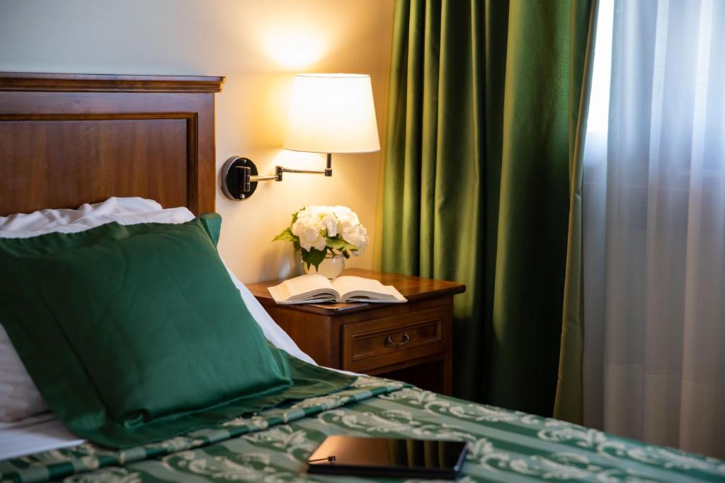 Postel nebo postele na pokoji v ubytování Hotel Ristorante Fior