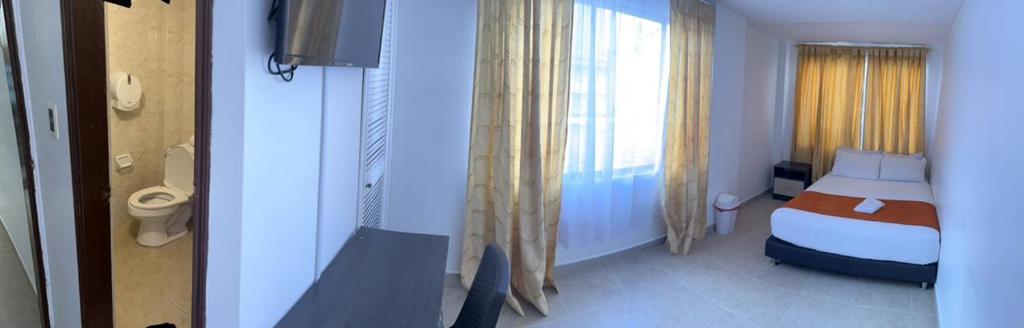 Postel nebo postele na pokoji v ubytování HOTEL EMBASSY STAR