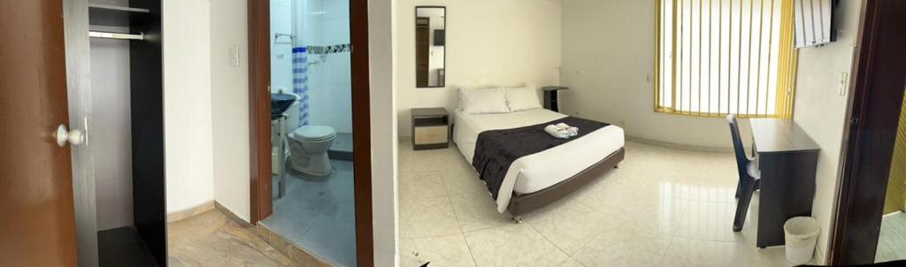 Postel nebo postele na pokoji v ubytování HOTEL EMBASSY STAR