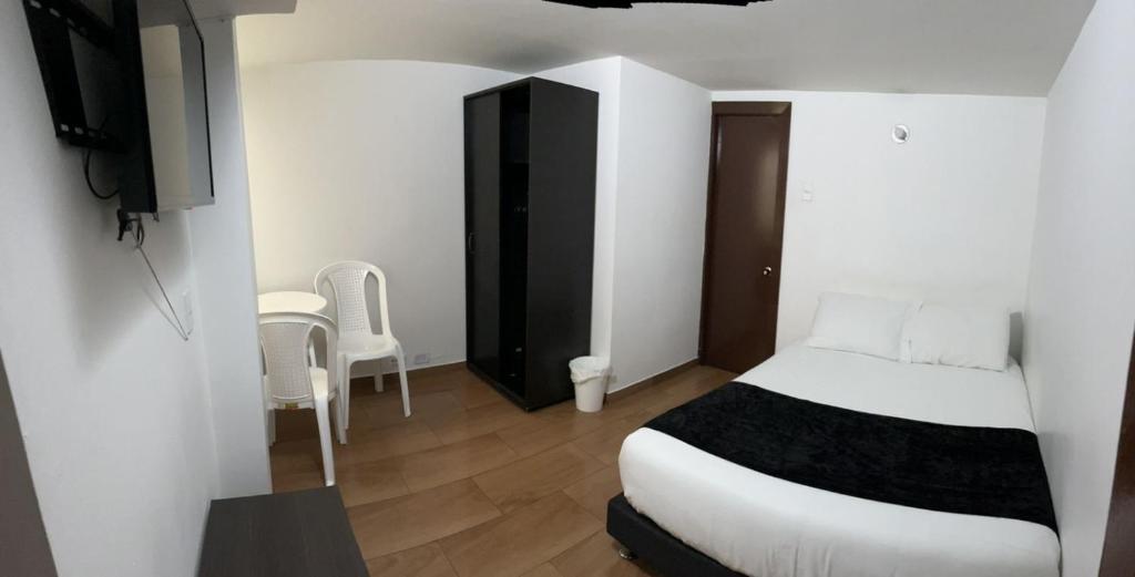 Postel nebo postele na pokoji v ubytování HOTEL EMBASSY STAR