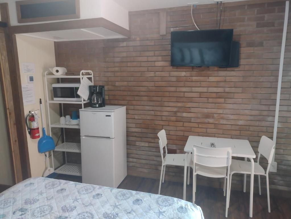 Kuchyň nebo kuchyňský kout v ubytování Belles Sea Inn