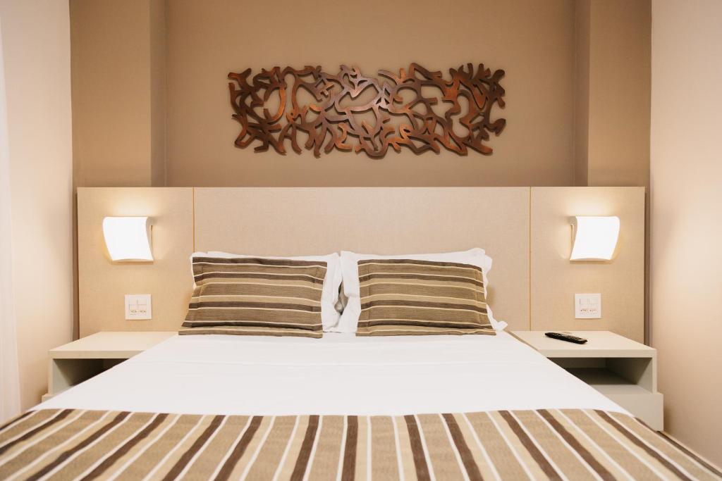 Cama ou camas em um quarto em Lagoon Prime Hotel