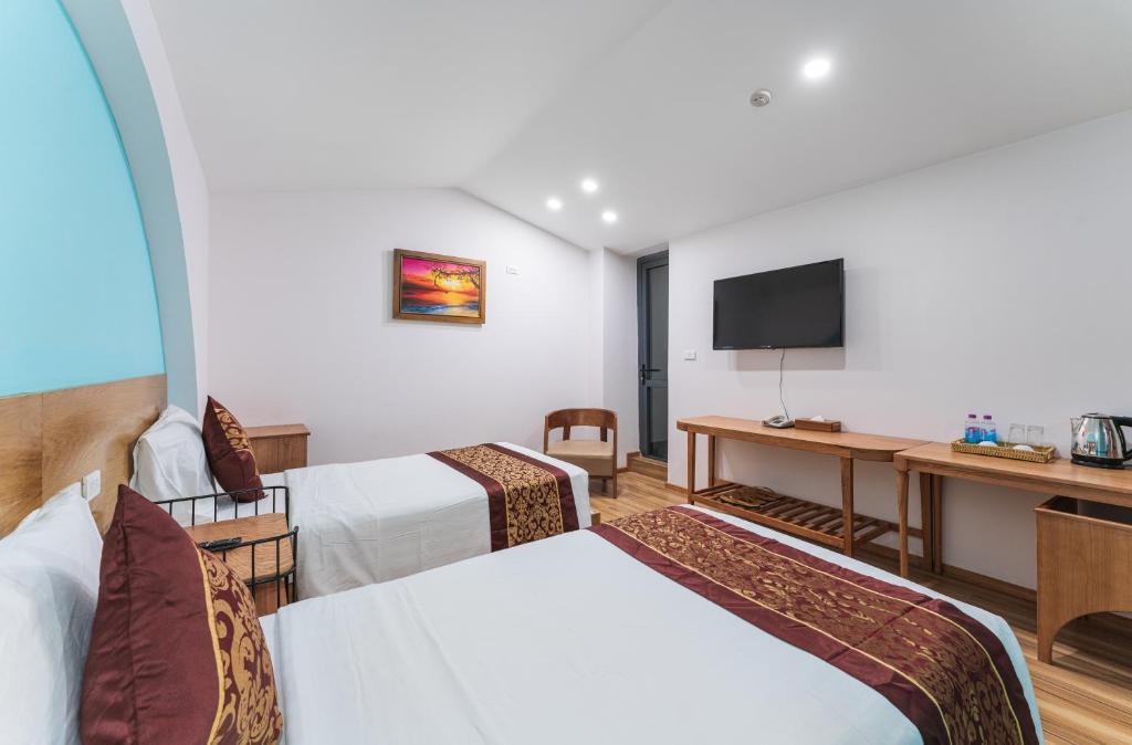 TV a/nebo společenská místnost v ubytování Prime New Hotel
