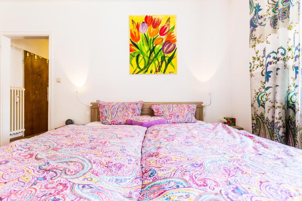 Postel nebo postele na pokoji v ubytování Altstadt-Süd - CGN Apartments