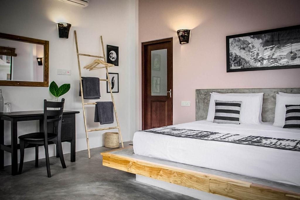 Postel nebo postele na pokoji v ubytování Haven Beach Hiriketiya, Serenevilla Properties