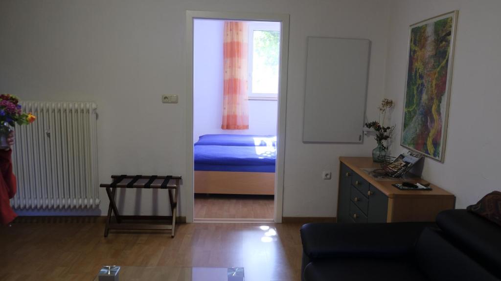 Postel nebo postele na pokoji v ubytování Gasthof Hirschenbräu Michel