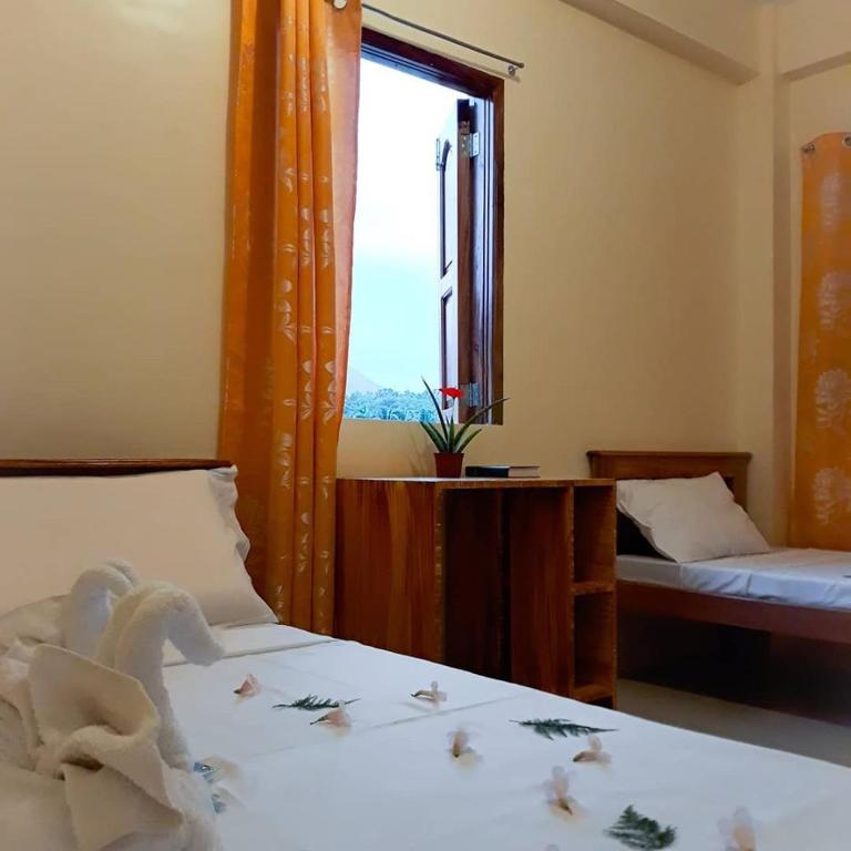 Postel nebo postele na pokoji v ubytování Baletin Hometel