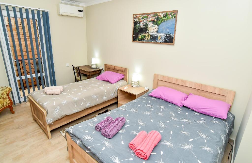Postel nebo postele na pokoji v ubytování Hotel MASPINDZELO