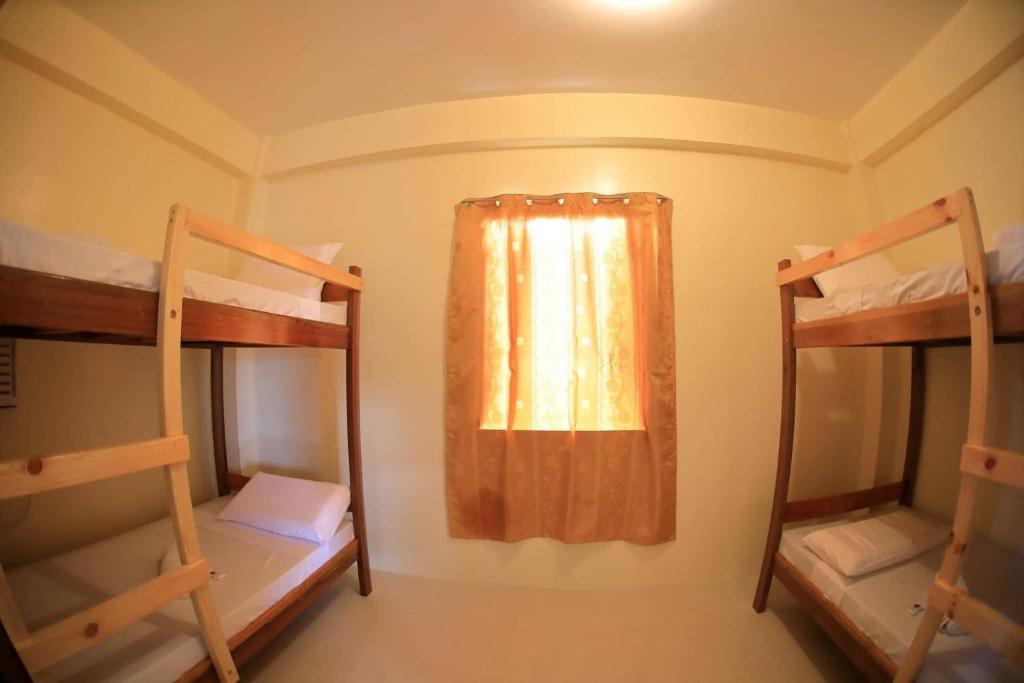 Postel nebo postele na pokoji v ubytování Baletin Hometel