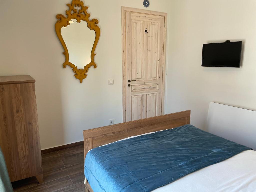 Posteľ alebo postele v izbe v ubytovaní Dimitris place
