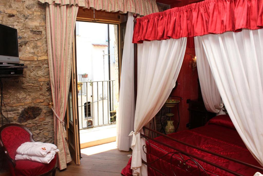 Postel nebo postele na pokoji v ubytování Principe Di Scilla