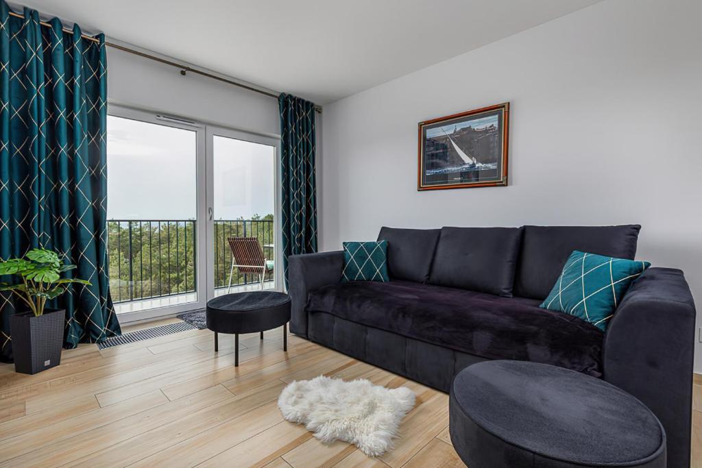A seating area at Na Wydmach Sea View by Renters Prestige