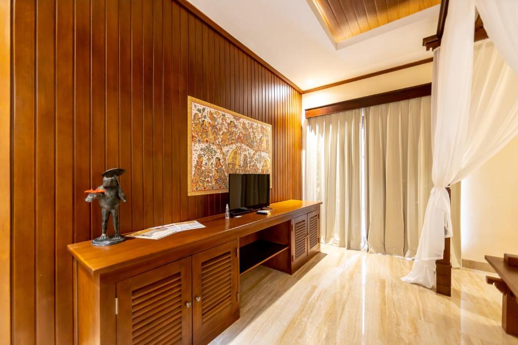 TV a/nebo společenská místnost v ubytování Champlung Sari Villa & Spa Ubud