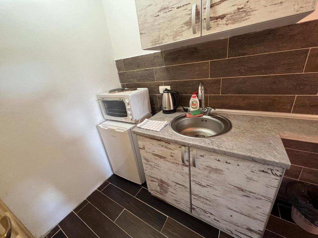 Kuhinja oz. manjša kuhinja v nastanitvi Dormire Apartmans