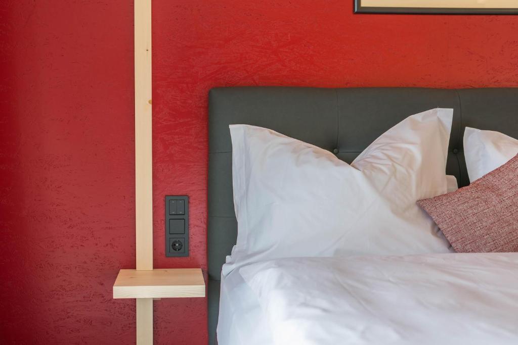 Postel nebo postele na pokoji v ubytování Aumia Apartment Rubin