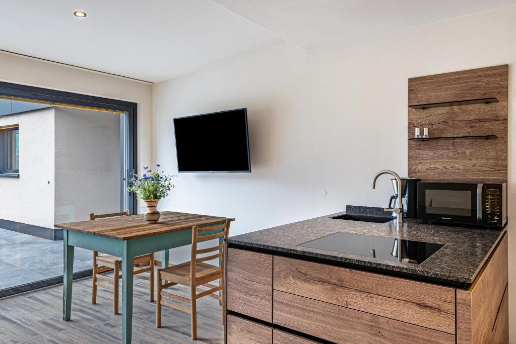 Kuchnia lub aneks kuchenny w obiekcie Aumia Apartment Opal